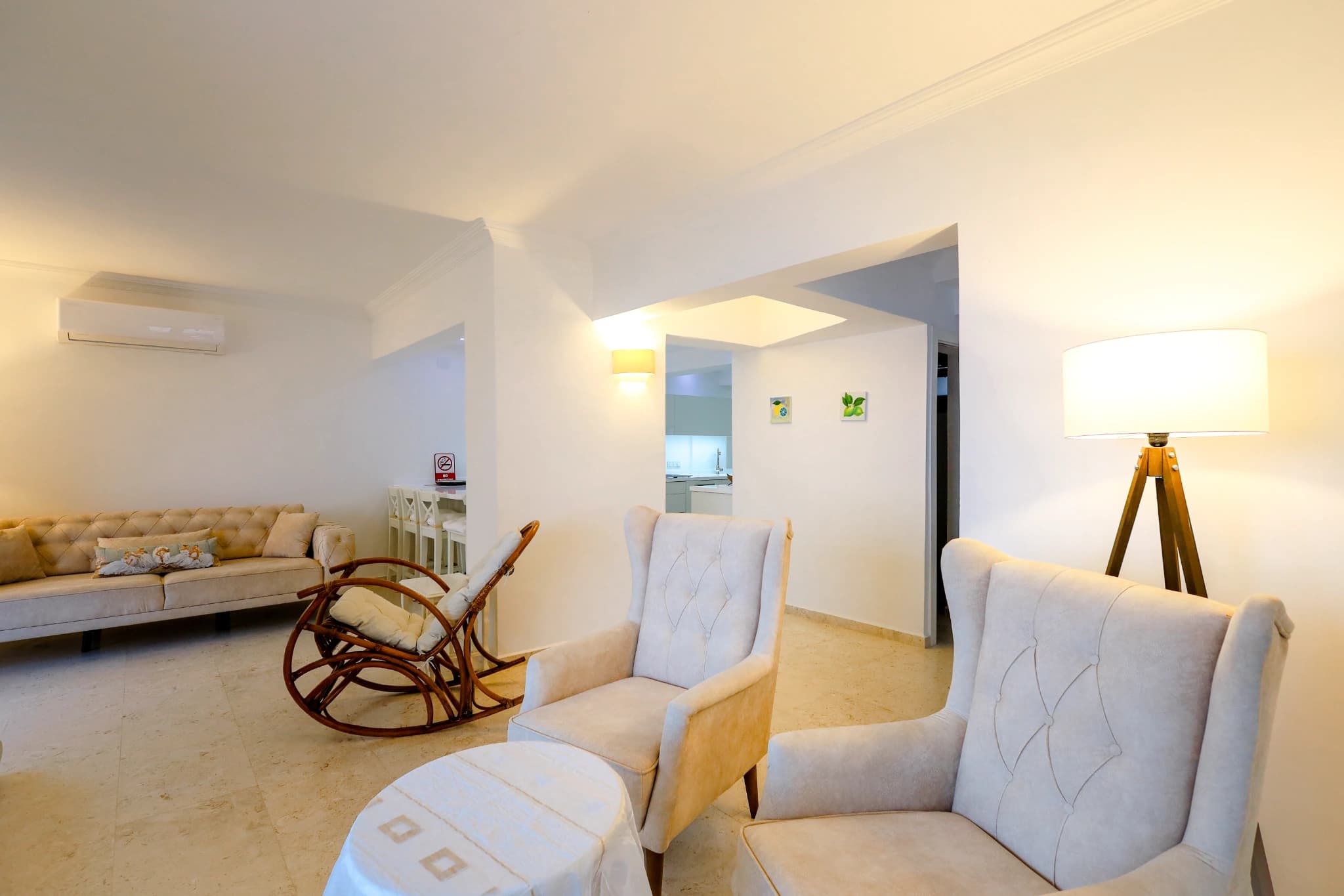 Spacious living room with comfortable seating and modern furnishings.